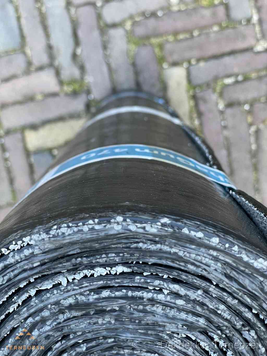 Rol bitumen dakleer met leislag voor plat dak in Terneuzen